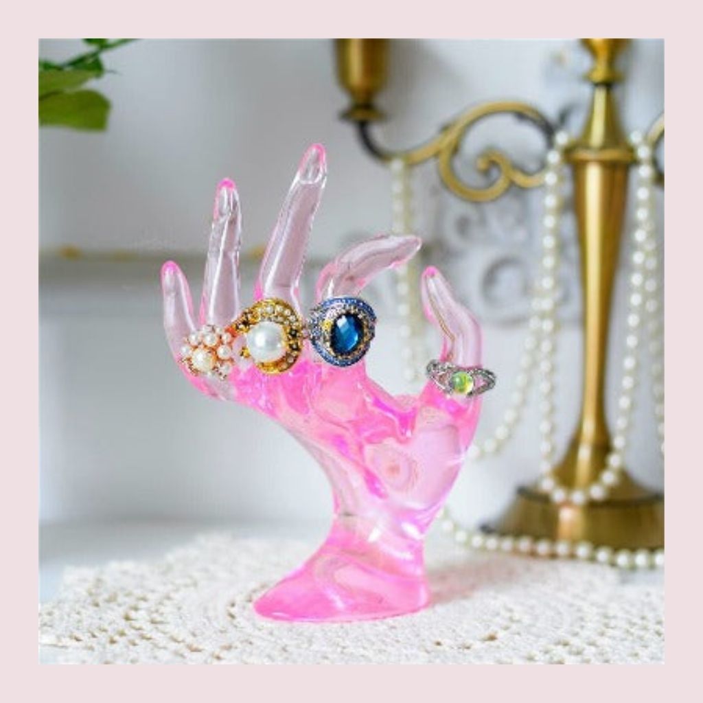 The hand jewelry display holder is made of polyresin and is designed with emulational hand shape. This Jewelry ring holder hand is used to display valuable bracelet, finger ring, wrist watch in shop window.